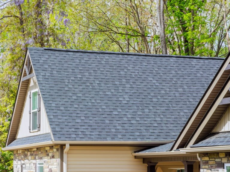 Asphalt shingles are used as roofing materials on roof of newly constructed house